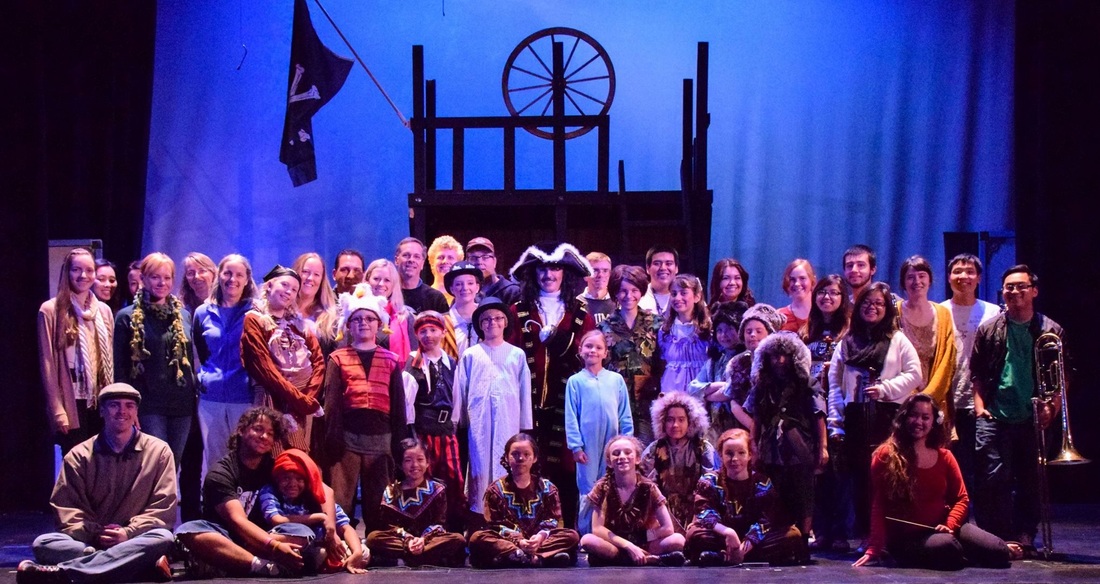 The cast, staff, orchestra, and volunteers from the musical 